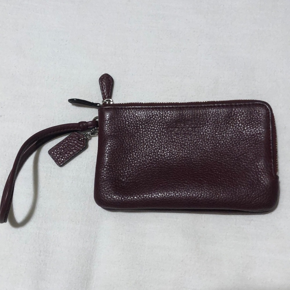 Coach burgundy wristlet